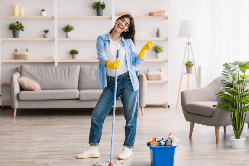 A woman ready to start spring cleaning her home.