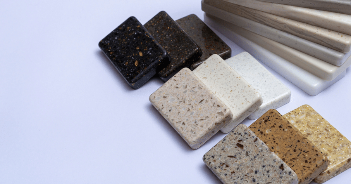 Samples of different types of marble, quartz, and granite countertops.
