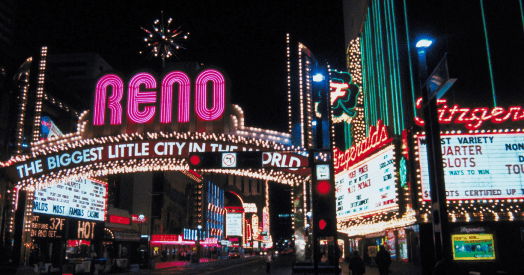 An image of the lights and marquis lit up at night in the heart of Reno, Nevada.