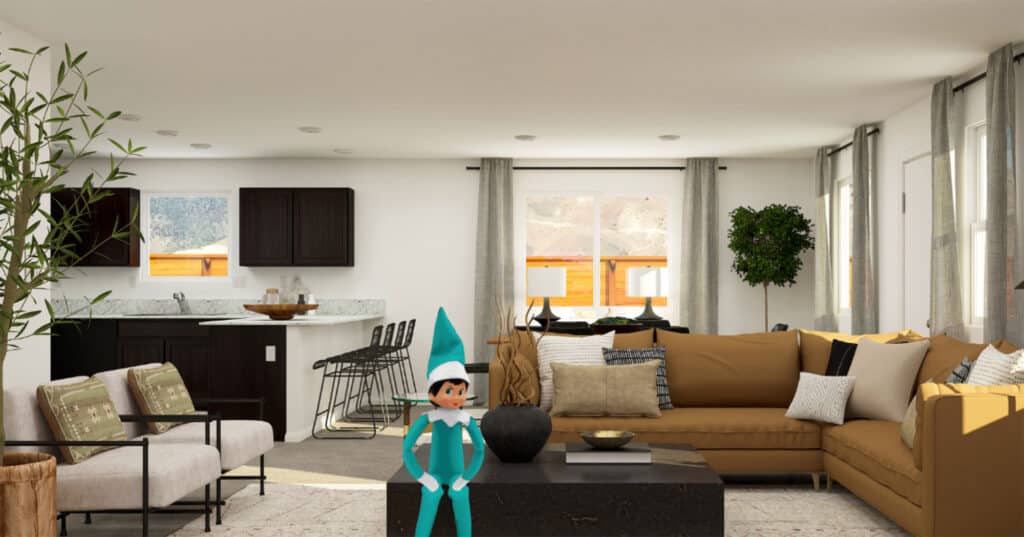 Jenni the elf sitting on a coffee table in Legacy Trails community living room.